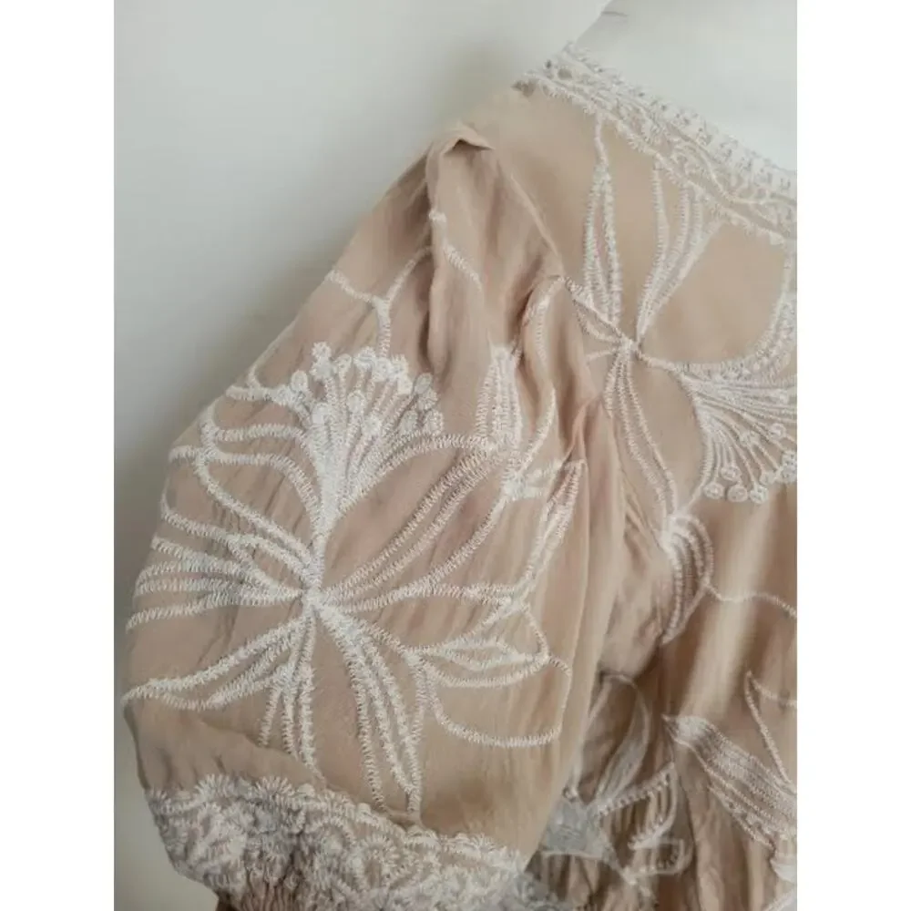 Cottage Garden Floral Embroidered Puff Sleeve Relaxed Fit Asymmetrical Blouse